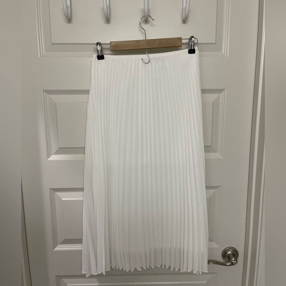 Babaton  white pleated skirt from Aritzia